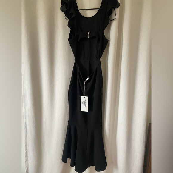 PICTURE is similar- not exact. Hello Molly / Saints Secrets black cut out dress - Picture 3 of 5